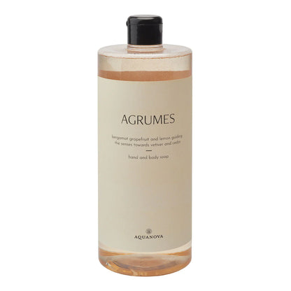 Bottle of Aquanova Agrumes hand and body soap on a white background
