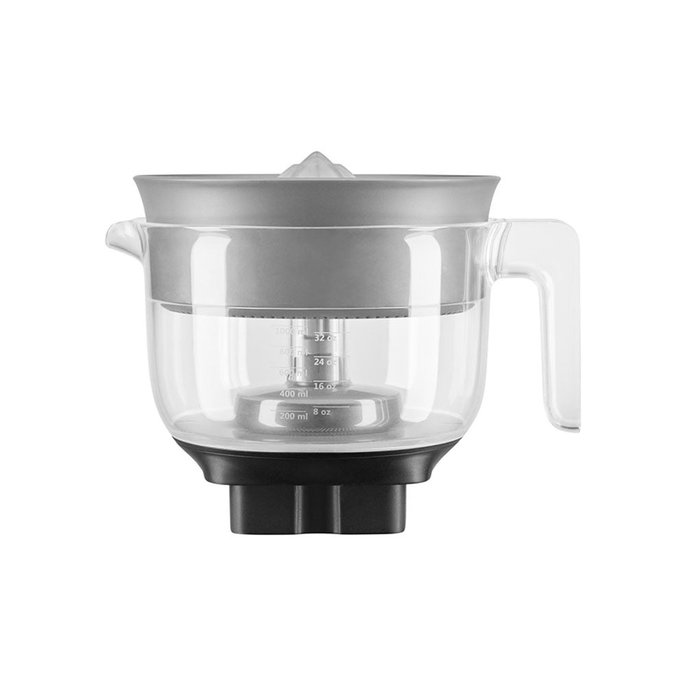 Clear kitchen appliance with black base on a white background