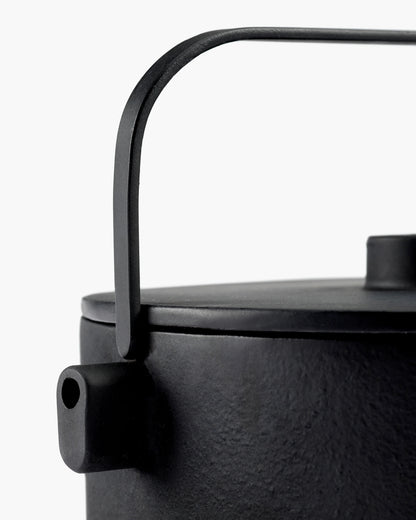 Tea pot cast iron black Collage