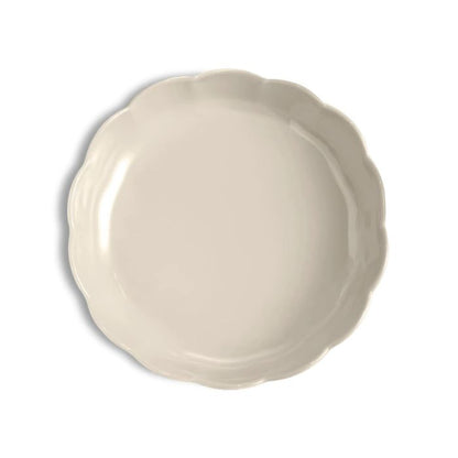 Emile Henry Round Cake Dish-Beige ceramic plate on a white background