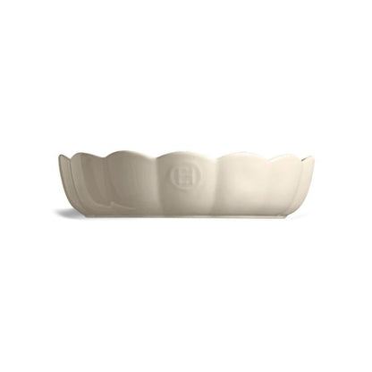 Emile Henry Round Cake Dish-White ceramic bowl with scalloped edge on a white background