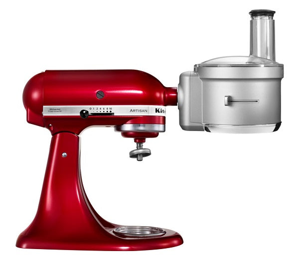 KitchenAid Red KitchenAid stand mixer with a juicing attachment on a white background