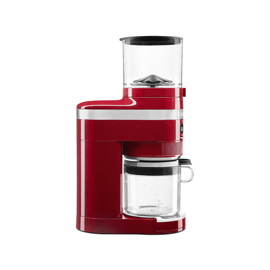 Red coffee maker with clear glass carafe on a white background