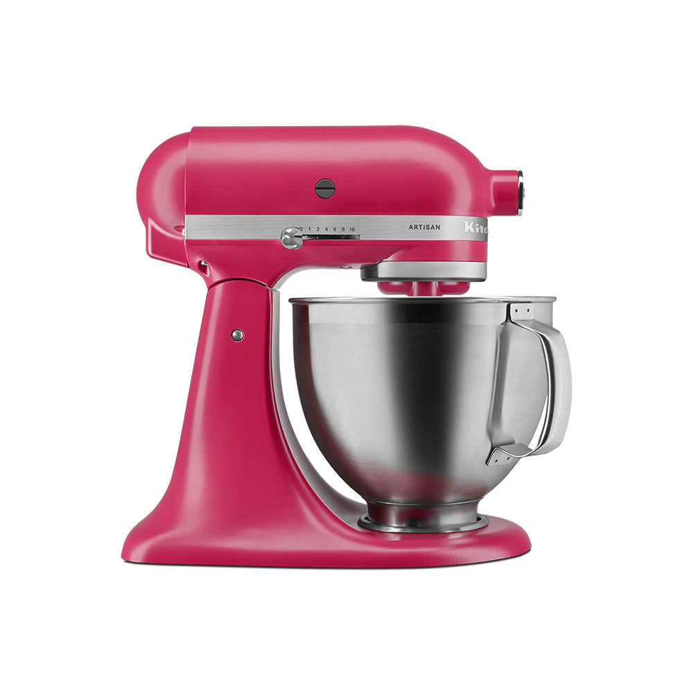 Pink KitchenAid stand mixer with a silver bowl on a white background