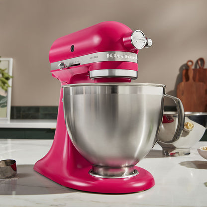 Pink KitchenAid stand mixer on a kitchen counter