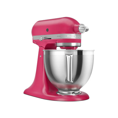 Pink KitchenAid stand mixer with a silver bowl on a white background
