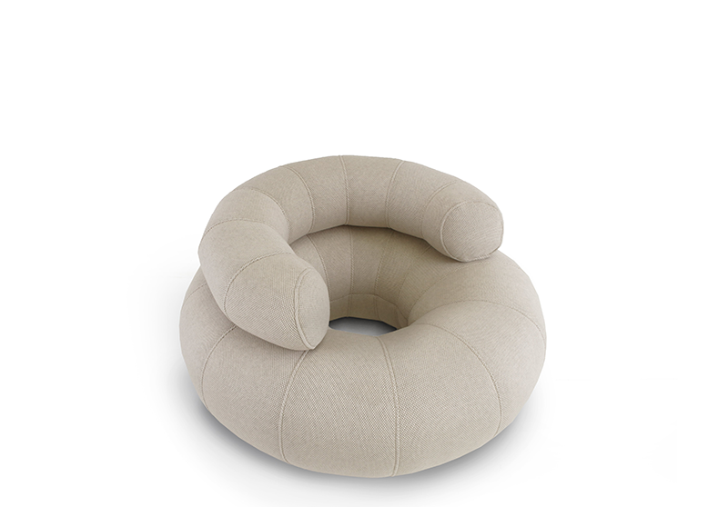 OGO Don Out Sofa L 3D-A beige Don Out Sofa L 3D designed for use in pools, featuring a round shape with a comfortable, tufted design.