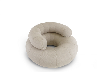 OGO Don Out Sofa L 3D-A beige Don Out Sofa L 3D designed for use in pools, featuring a round shape with a comfortable, tufted design.