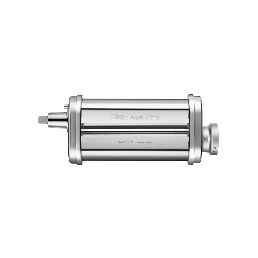 Metallic cylindrical object with 'KitchenAid' branding on a white background