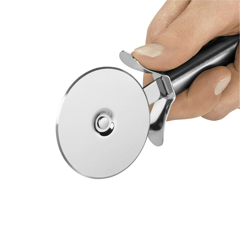 Profi Plus Pizza Cutter-kitchen utensil-Hand holding a silver pizza cutter against a white background