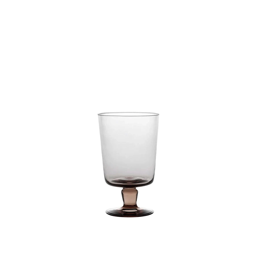Clear glass with a dark base on a white background