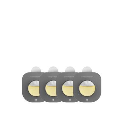 Four gray containers with white lids on a white background