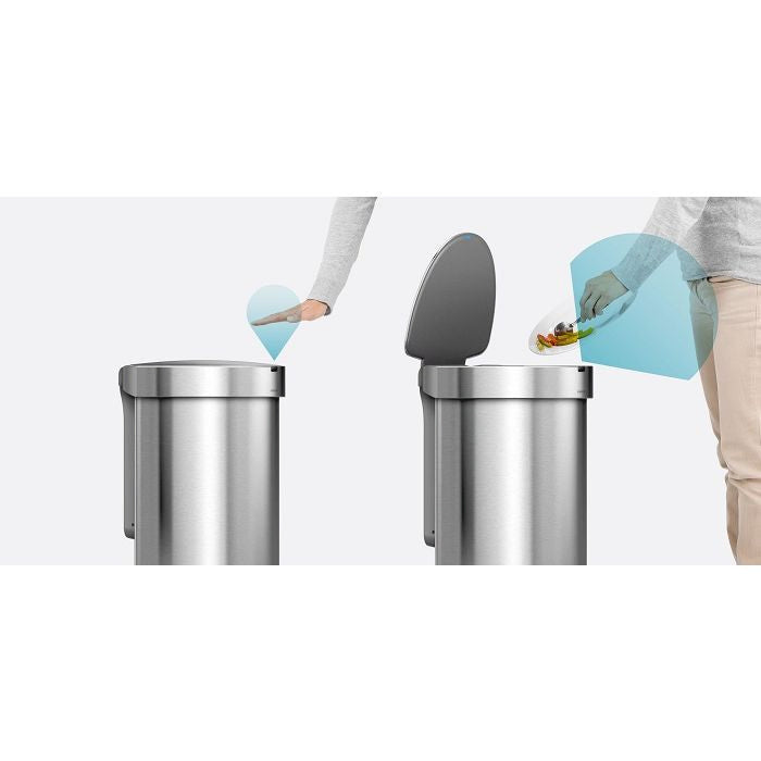 Simplehuman Semi Round Sensor Bin With Liner Pocket-Person using a trash can with a foot pedal on a white background