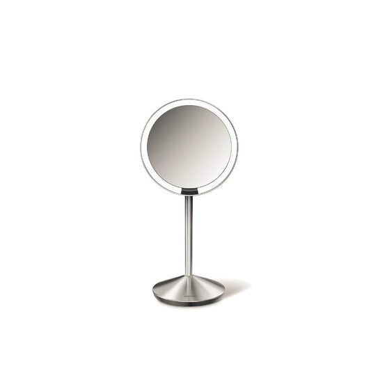 Simplehuman Sensor Mirror Fold with Travel Case-Round makeup mirror on a stand with a white background