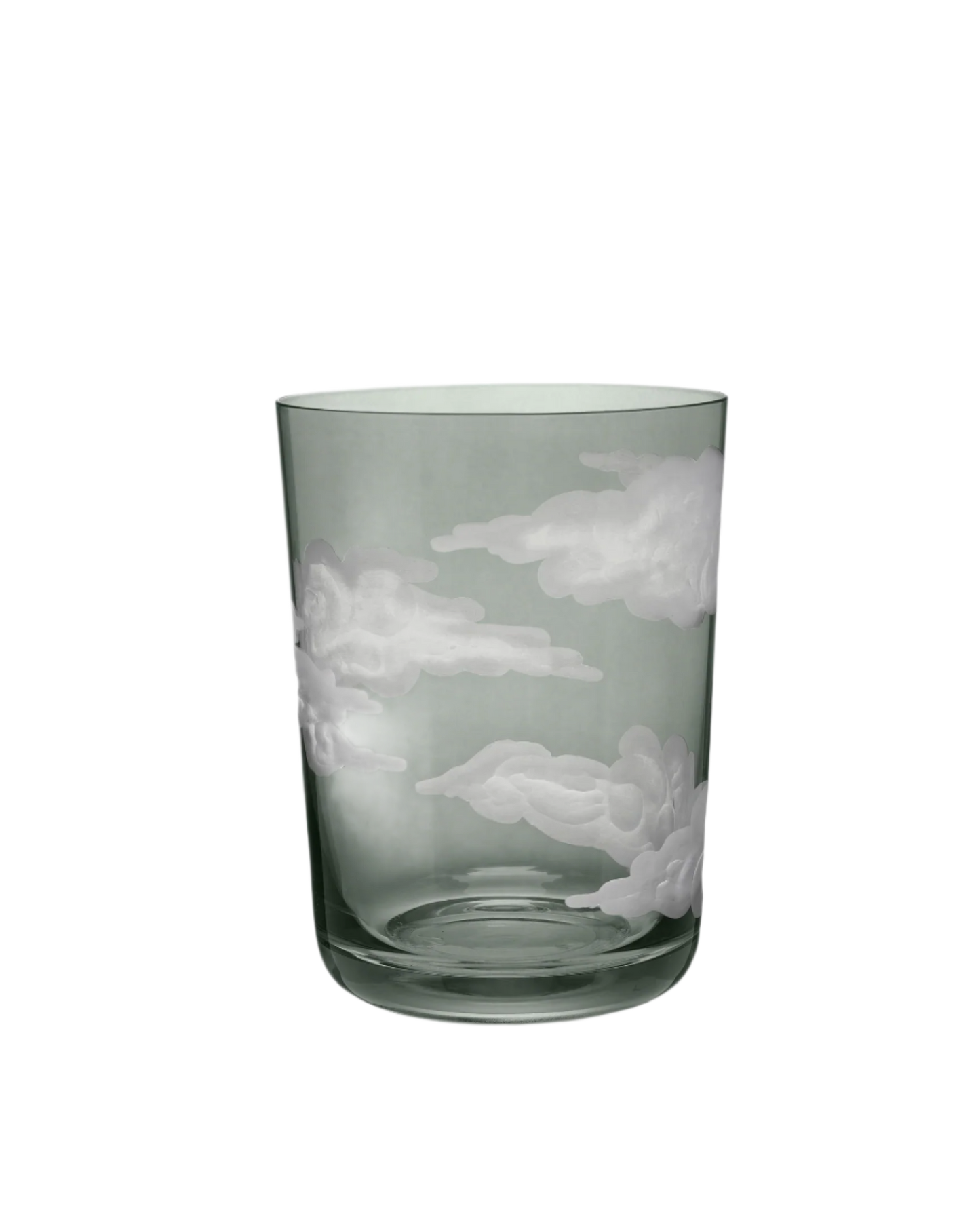 A clear glass tumbler with hand-engraved cloud designs.