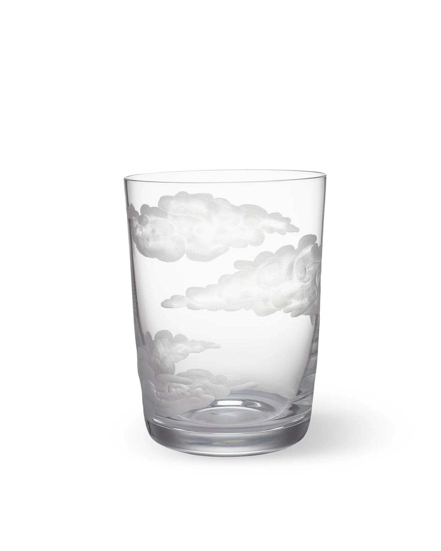 A clear glass tumbler with hand-engraved cloud designs.