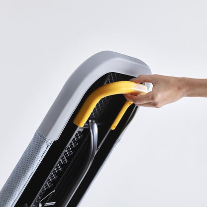 UAE laundry room-Hand opening a car door with a yellow handle on a white background
