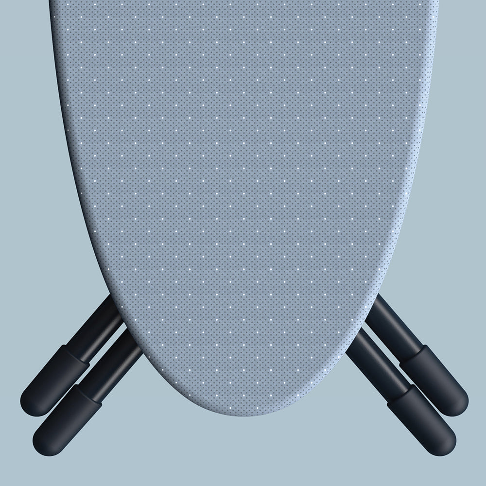 UAE laundry room-Close-up of a gray ironing board with black legs on a light blue background