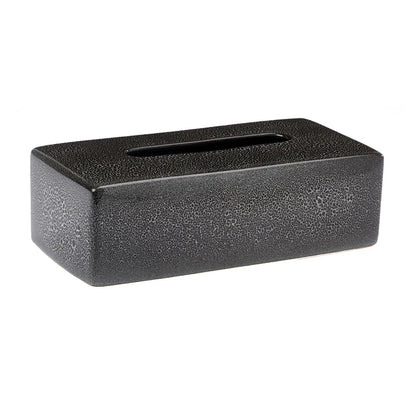 Rectangular black textured tissue box on a white background