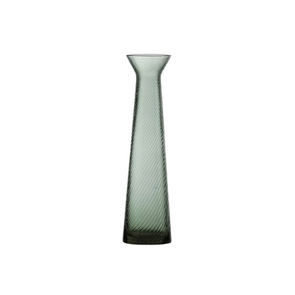 Tall, ribbed glass vase on a white background