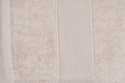 Verona Towel Set-Close-up of a textured beige rug with a subtle pattern