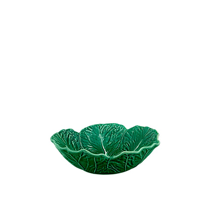 Green ceramic leaf-shaped bowl on a white background