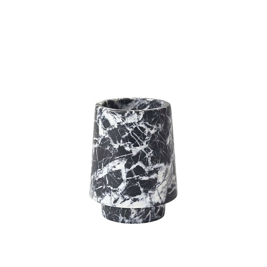 Marble-patterned cylindrical container on a white background