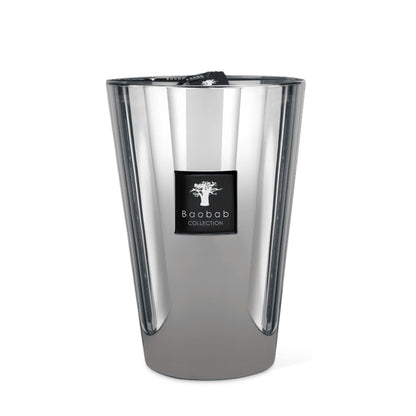 A silver-colored cylindrical candle holder with a reflective surface and a label in the front.