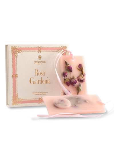 A scented wax tablet with rose and gardenia fragrance, presented in a box with a pink floral design.