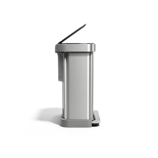 Silver trash can with a lid on a white background