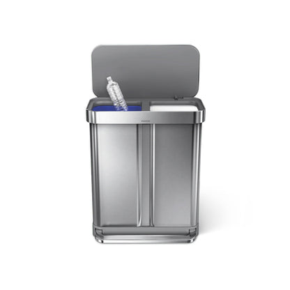 Silver trash can with a gray lid on a white background