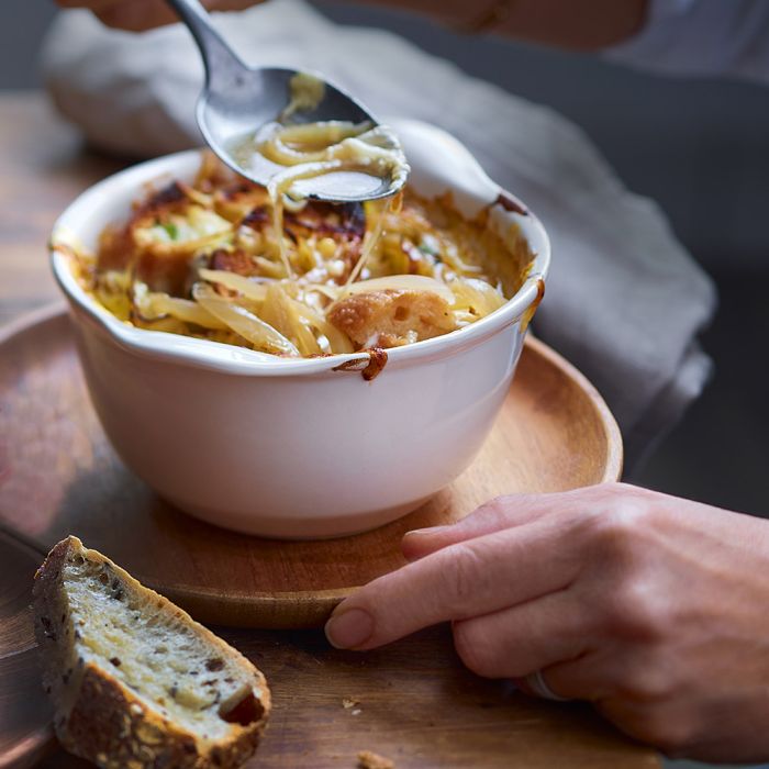 Emile Henry Gratin Bowl, 14cm-Bowl of pasta with a spoonful being lifted, bread on the side