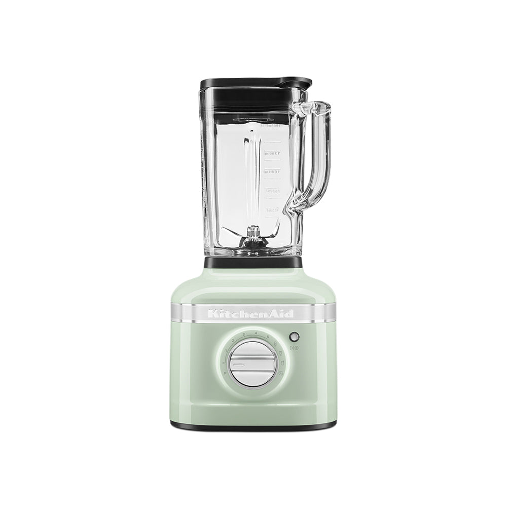 Mint green blender with clear container on a white background