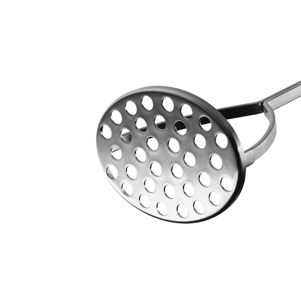 Metal skimmer with holes on a kitchen utensil