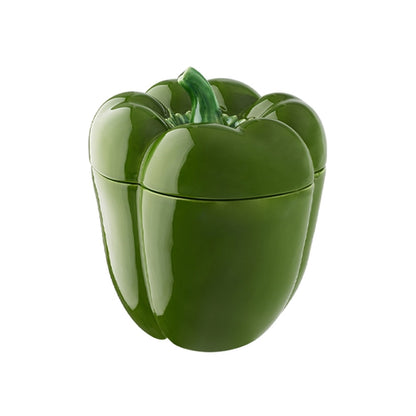 Green plastic pepper-shaped container on a white background
