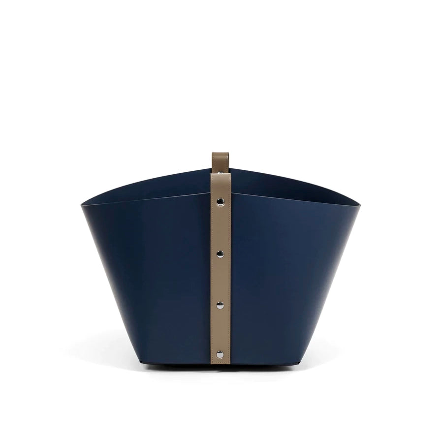 Navy blue metal basket with a brass band on a white background