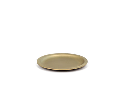 A round gold-colored soap dish with a matte finish, isolated on a white background.