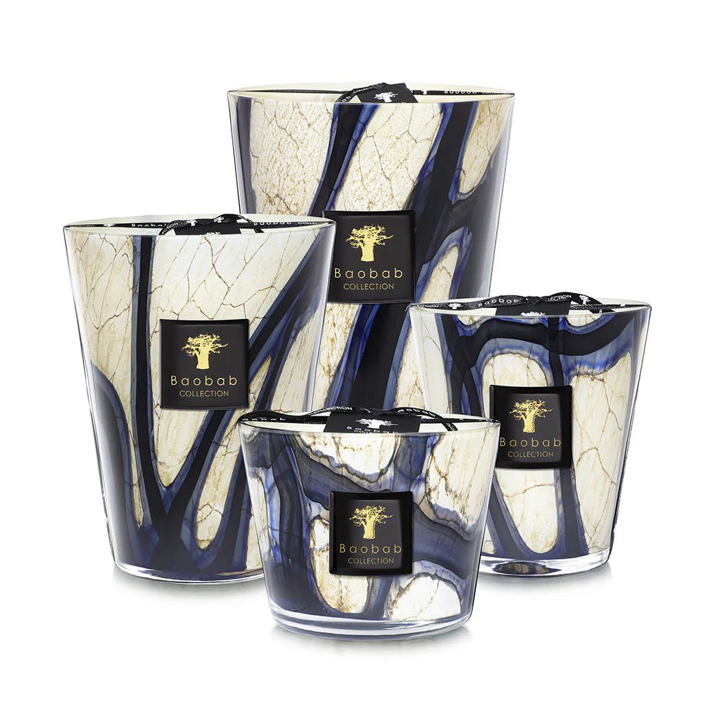 scented candles-Set of three decorative candles with marble-like design and Baobab Collection label on a white background