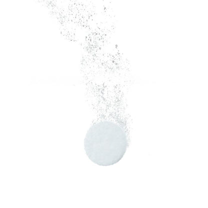 Bubbling clear liquid with a small droplet on a white background
