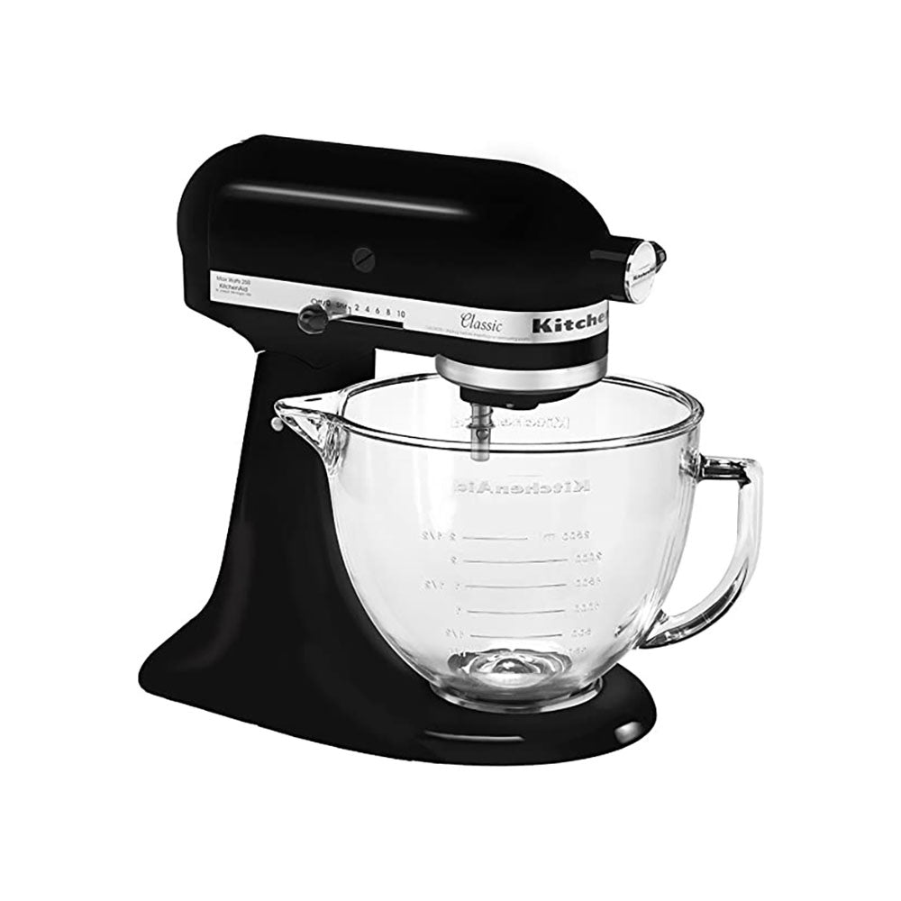 Black KitchenAid stand mixer with clear glass bowl on a white background