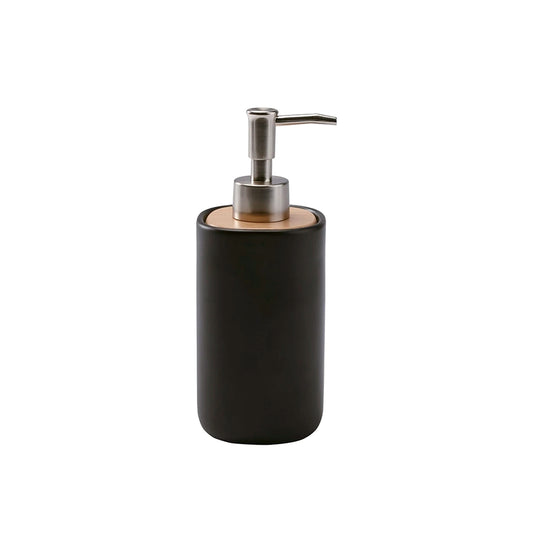 Black soap dispenser with wooden base and silver pump on a white background