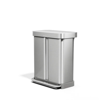 Stainless steel trash can on a white background