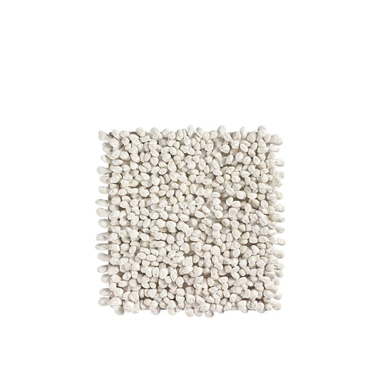 Square piece of textured white fabric on a white background