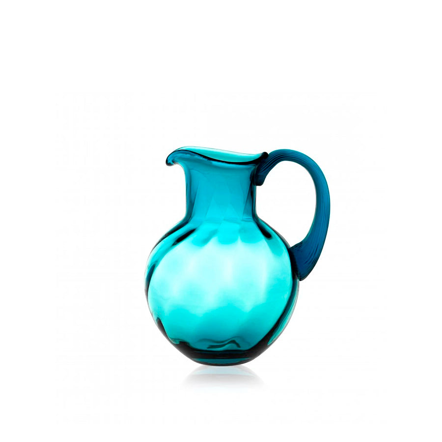Turquoise glass pitcher on a white background